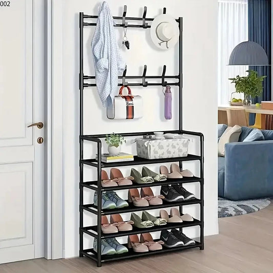 A clothes hanger and shoe rack at the entrance,